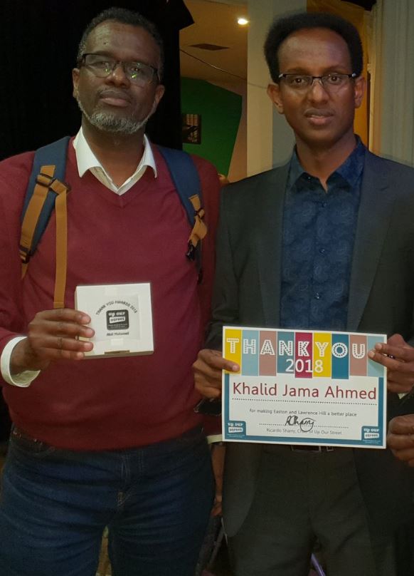 Abdi Mohamed and Khalid Ahmed receiving Up Our Street Thank You Awards 2018