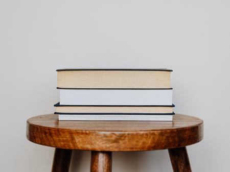 Books sitting on a chair